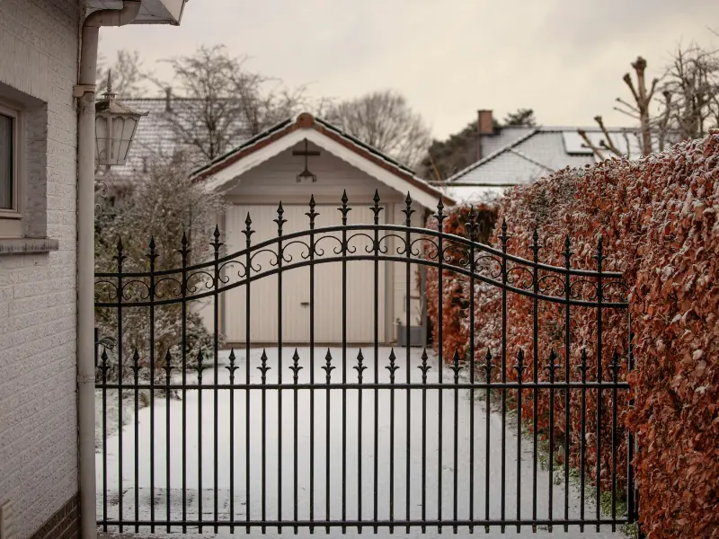 Automated gate system at a secure property entrance